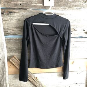 dynamite size Med Black high neck, long sleeve, asymmetrical peekaboo